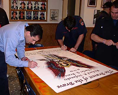 FDNY signs banner for Pittsburg Fire Department